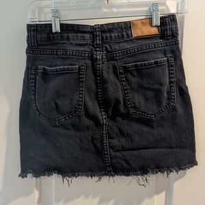 Black ripped denim skirt